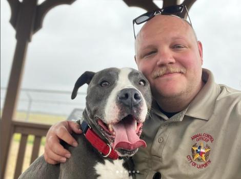 Mitch Turner-Beasley, a La Porte animal control officer, with Hester the dog