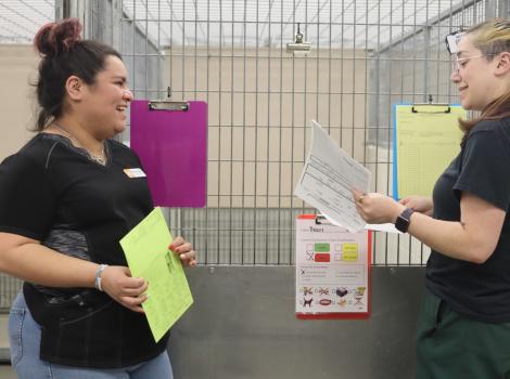 Jakie Hernandez with another person doing population rounds at a shelter