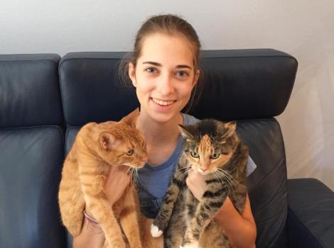 Best Friends in L.A. teen volunteer Keely with two cats