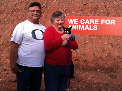 Couple with their adopted dog