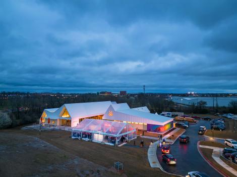 The outside of the Best Friends Pet Resource Center in Northwest Arkansas at dusk