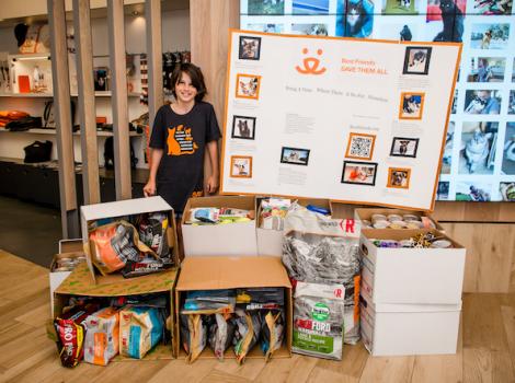 Melodie at the Pet Adoption Center with her donations