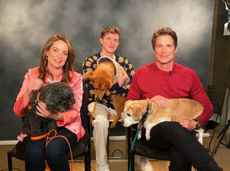 Rob Lowe, Kimberly Williams-Paisley and Johnny Berchtold of Netflix's DOG GONE holding dogs