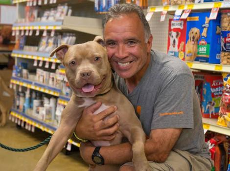 Volunteer Peter Vega with alum, Porkchop