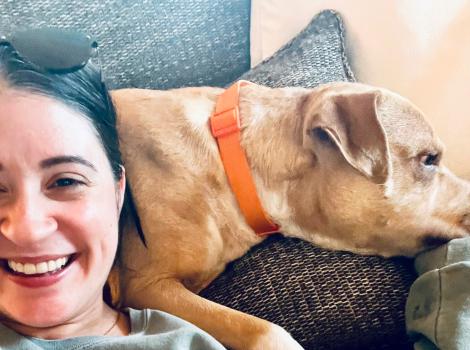 Selfie of Milo the dog lying down next to Amber