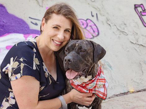 Person hugging Henrietta the dog