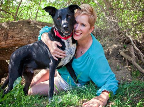 Wendy, a Best Friends in LA volunteer, with a dog