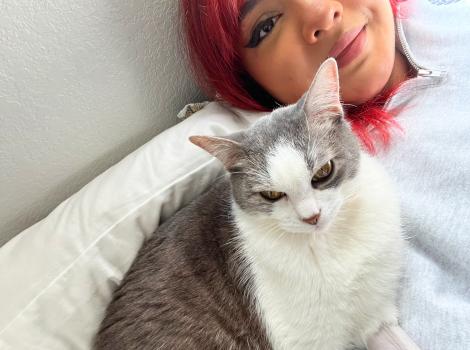 Selfie of Sir Karen the cat (looking a little grumpy) with Taylor Seupaul